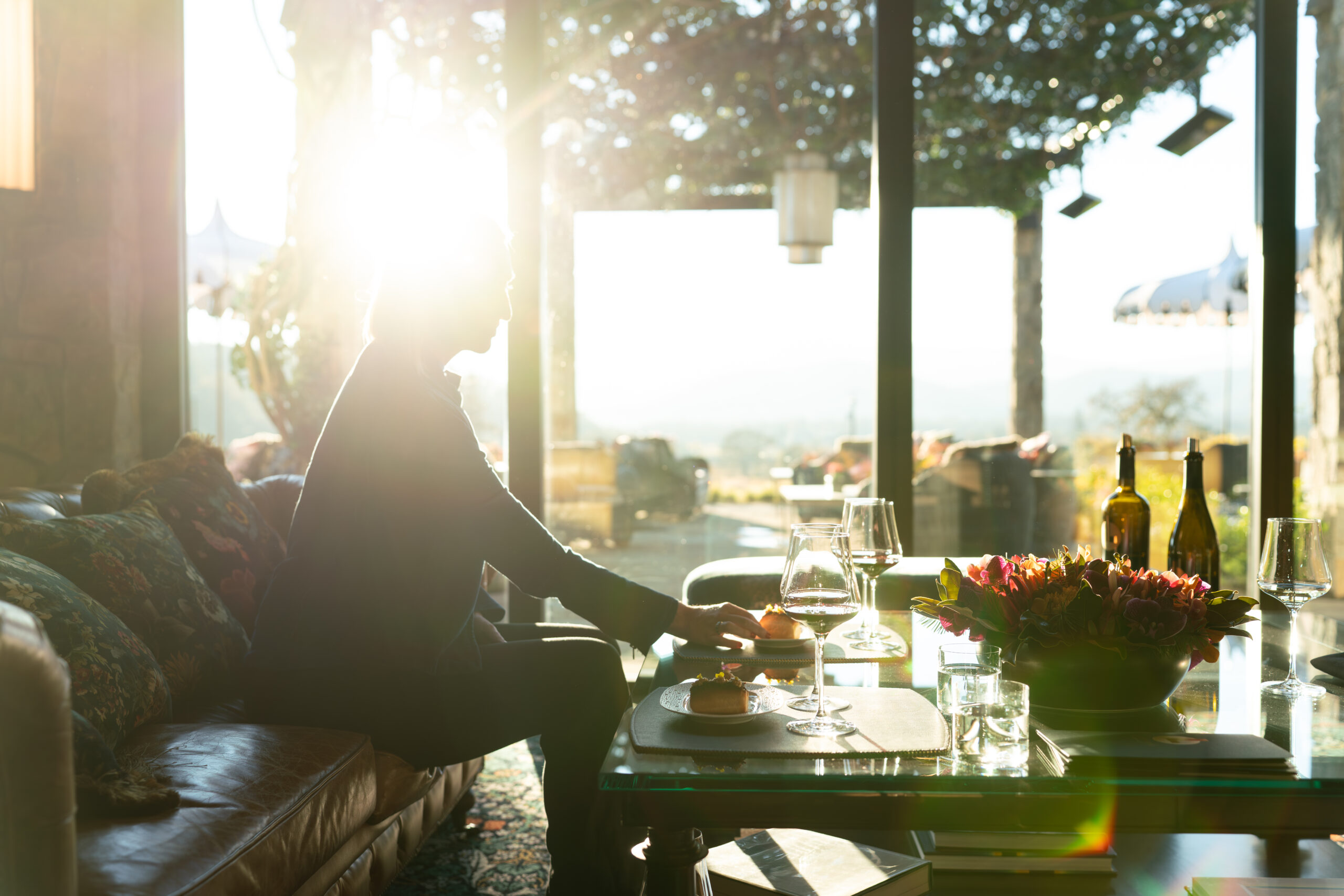 Woman enjoying a wine tasting experience in wine country